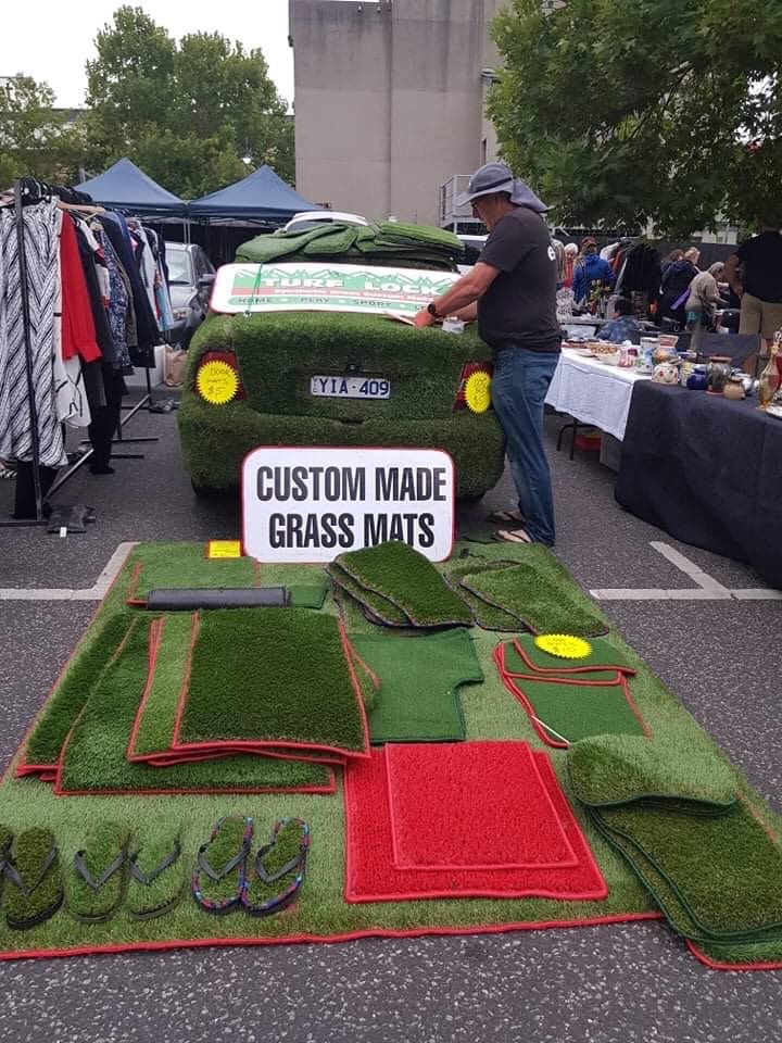 Turf Lock market stall with custom made grass mats and the iconic grass-wrapped car